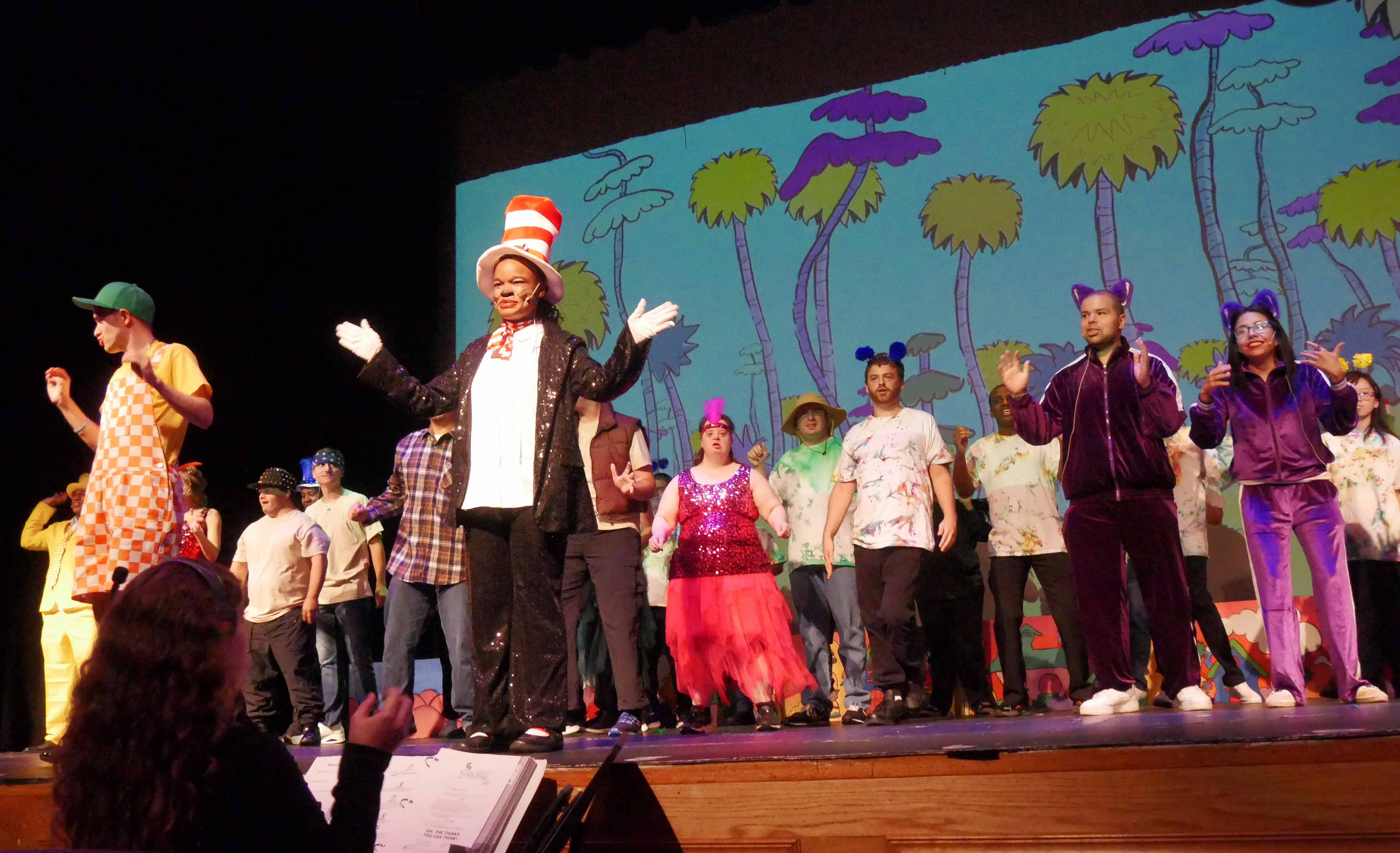 NJFH performers on stage in a theater production