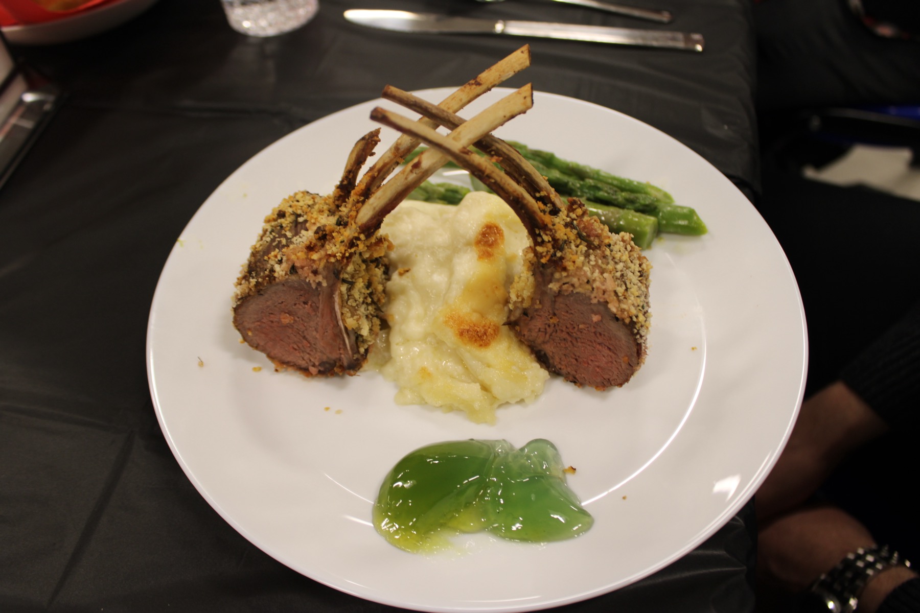 Plated lamb chops with potatoes and asparagus